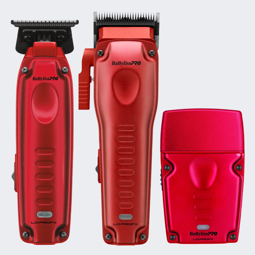 Three red BabylissPRO LDProX cordless hair clippers and a matching red charging case arranged on a light gray background.