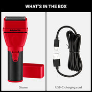 A 'What's in the Box' product display showing a red and black Balyliss Pro shaver with its red protective cover and a black USB-C charging cord on a white background with a black header.
