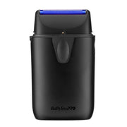 A black BaBylissPRO electric shaver shown from the front against a plain white background, featuring a blue illuminated razor head and the brand name printed near the bottom.