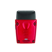 A red and black BabylissPRO London cordless shaver shown from the back, featuring a metallic red casing with a black top section and silver metal contact points.