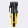 A VGR Muscular cordless hair clipper shown from the front against a light gray background. The clipper features a black upper body with gold branding and a bright yellow lower body with a digital LED display showing '88'.