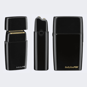 Three views of a BaBylissPRO black electric shaver and matching case on a light gray background: one open showing the metallic blade, one upright showing the handle, and one closed showing the front of the case with the BaBylissPRO logo.