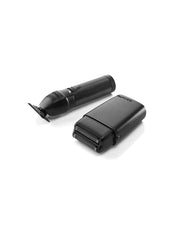 Black electric shaver on a white background